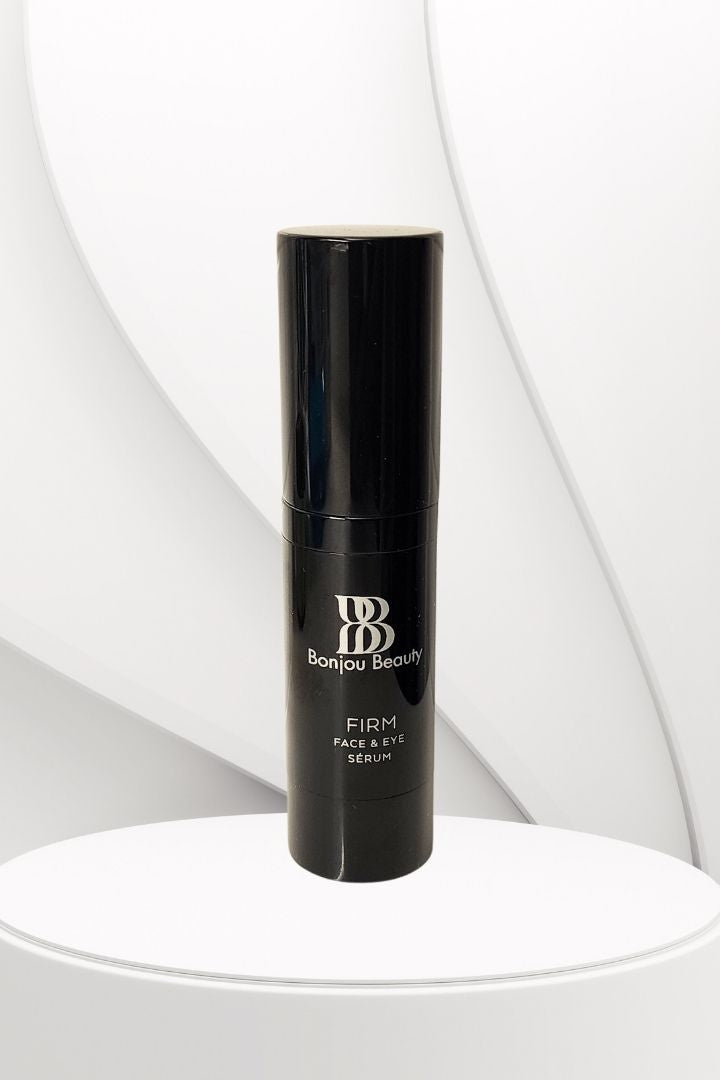 Black Firm Face and Eye serum bottle with 'Banjou Beauty' branding on a white background