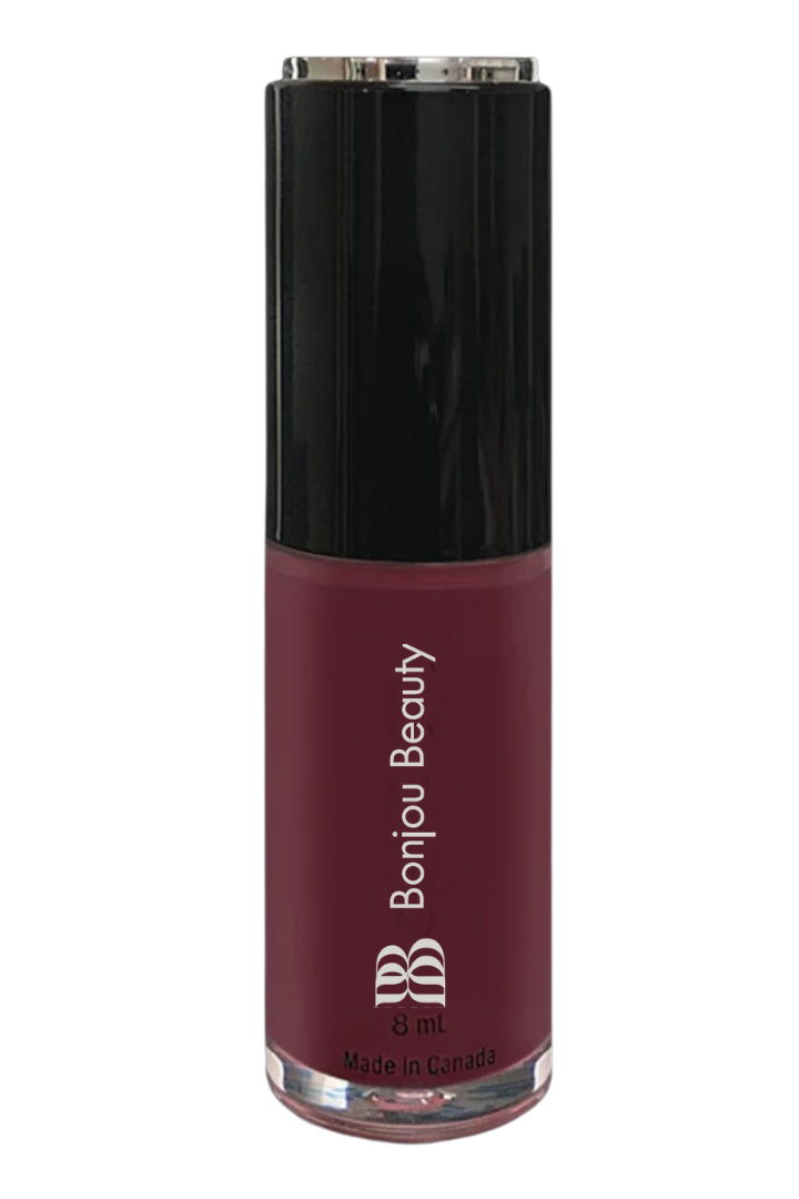 Sherry shade of Bonjou Beauty vegan lip gloss on a white background