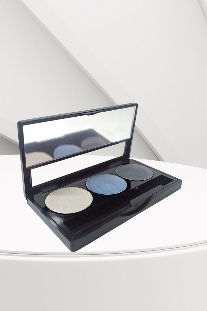 Makeup palette with four colors on a white surface