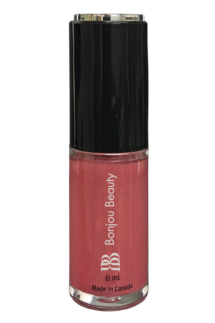 Plum shade of vegan lip gloss  in a bottle with black cap featuring 'Bonjou Beauty' branding.