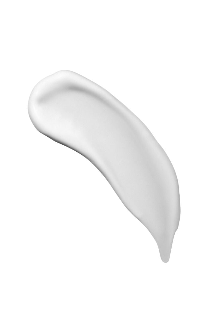 White eye cream swatch on a white background
