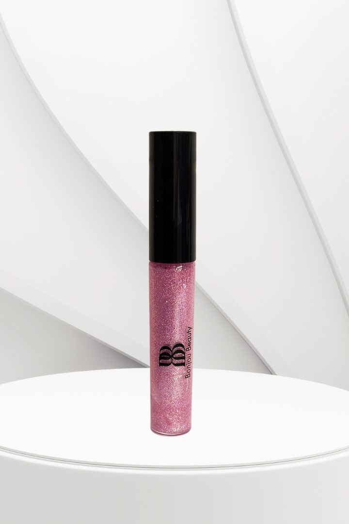Pink Gloss Wear Shade on white table