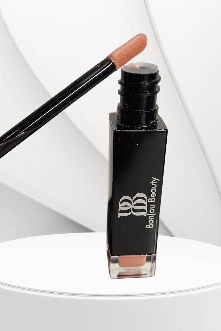 Lip Plumper Gloss wand and bottle