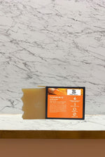 Turmeric Bar Soap  and package on a counter