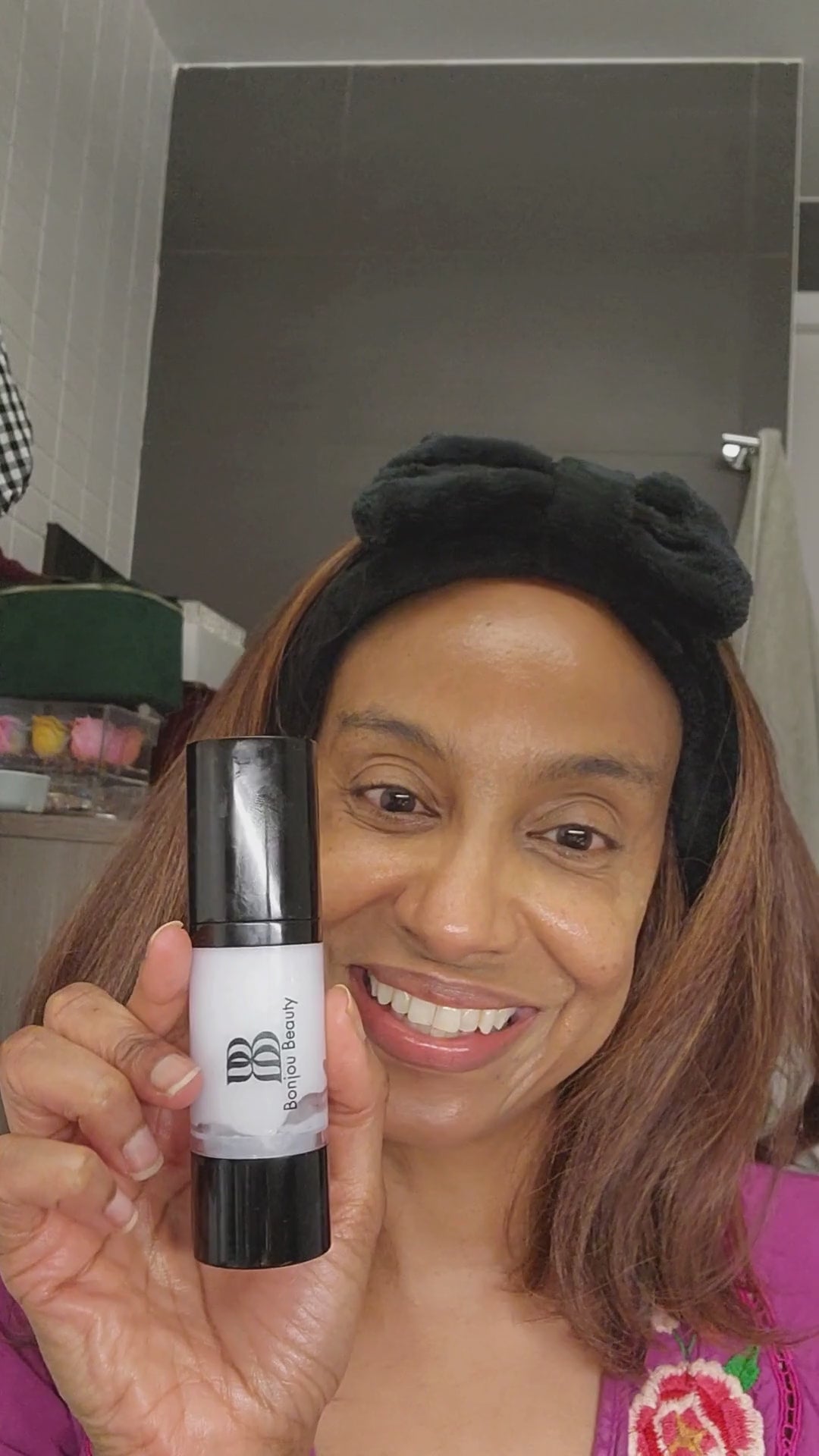 Putting on water based primer before makeup