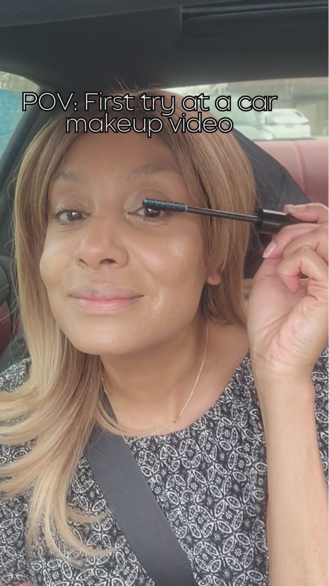 Getting ready in the car with Maximize mascara as a passenger