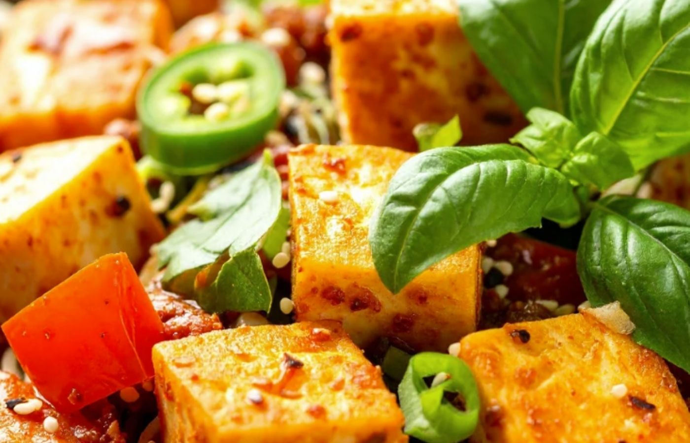 Tofu vegetables and basil close up