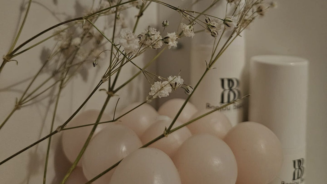 Photo of Bonjou beauty cream behind baloons and a plant for Tariffs and do they impact Bonjou Beauty's products