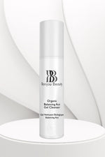 Bonjou Beauty Organic Balancing Act Gel Cleanser bottle on a white table and background