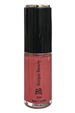 Plum shade vegan lip gloss on a white background with black cap