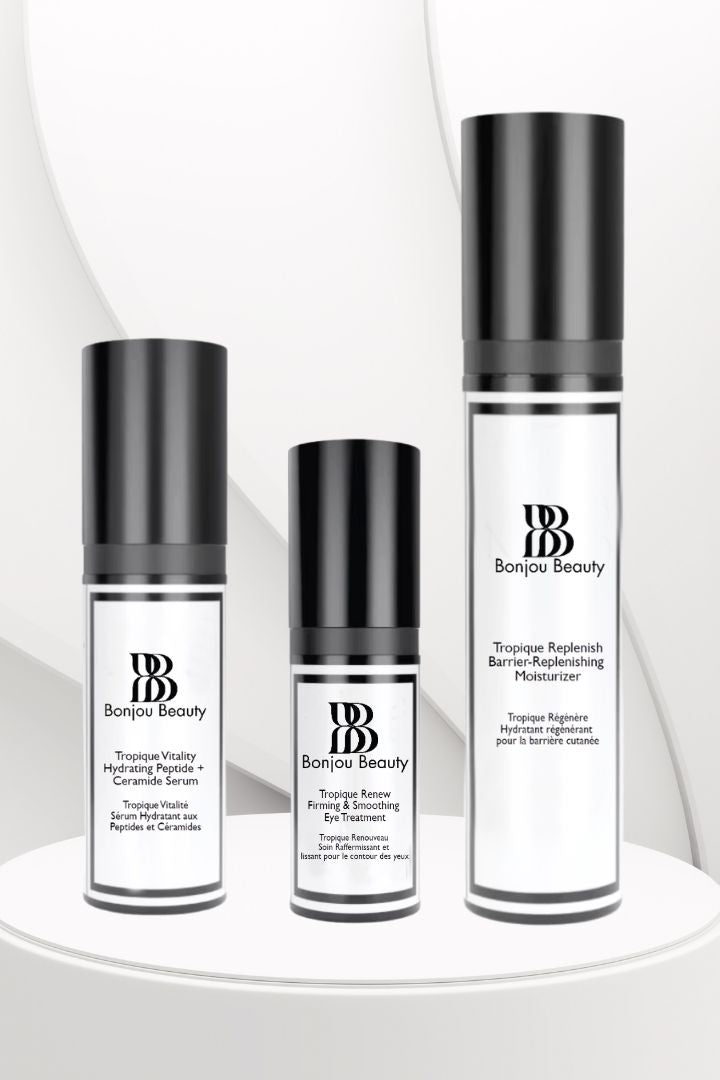 Set of 3 Tropique skincare products from Bonjou Beauty on a white table and background