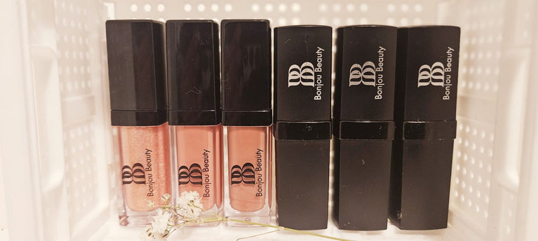 three lip glosses and three lipsticks in a row