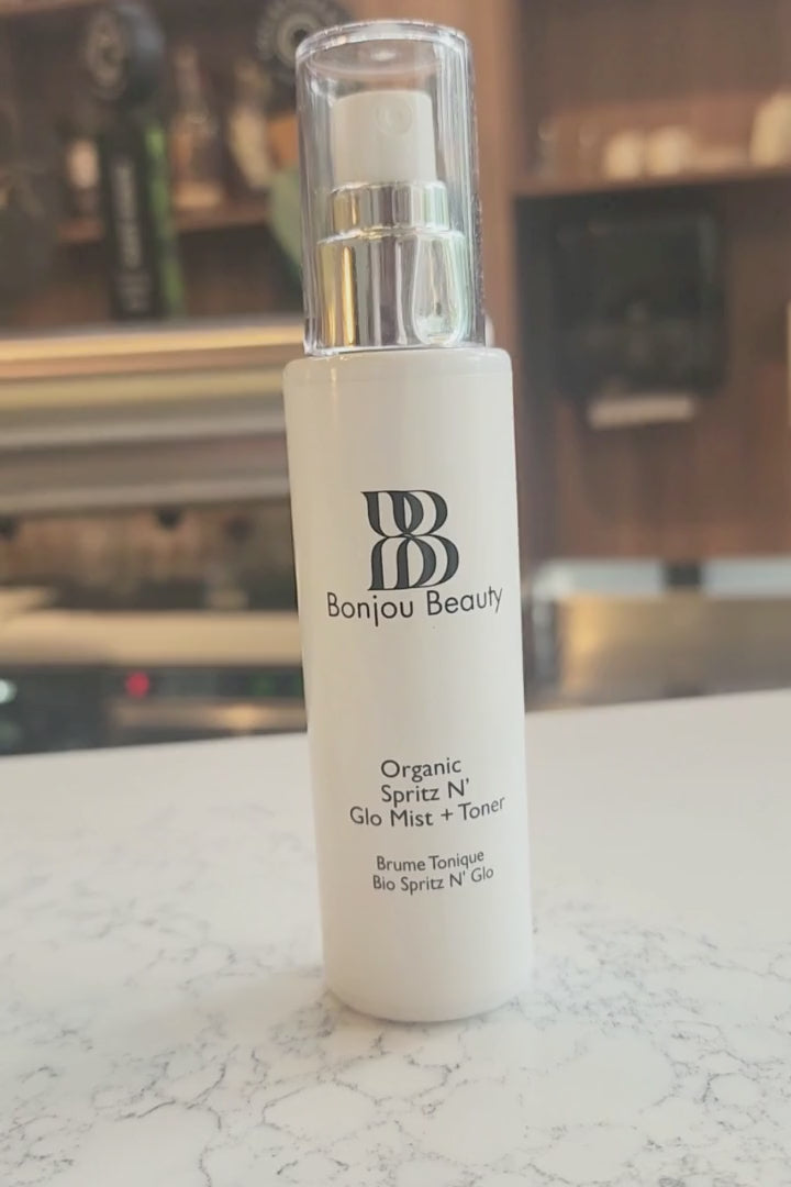 Spritz N Glo bottle on a table outside