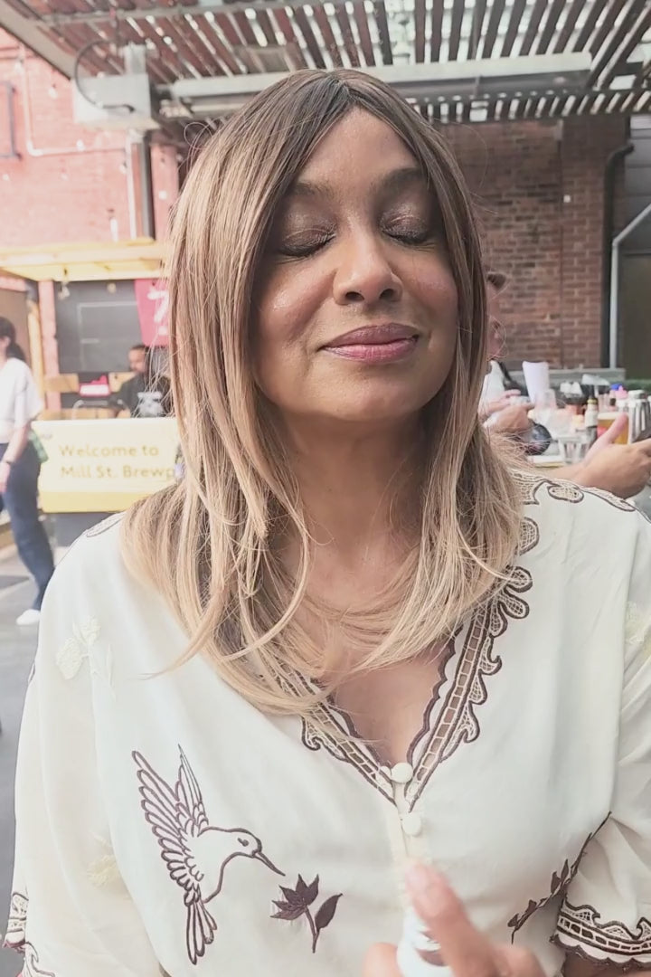 Woman using Spritz N Glo outside